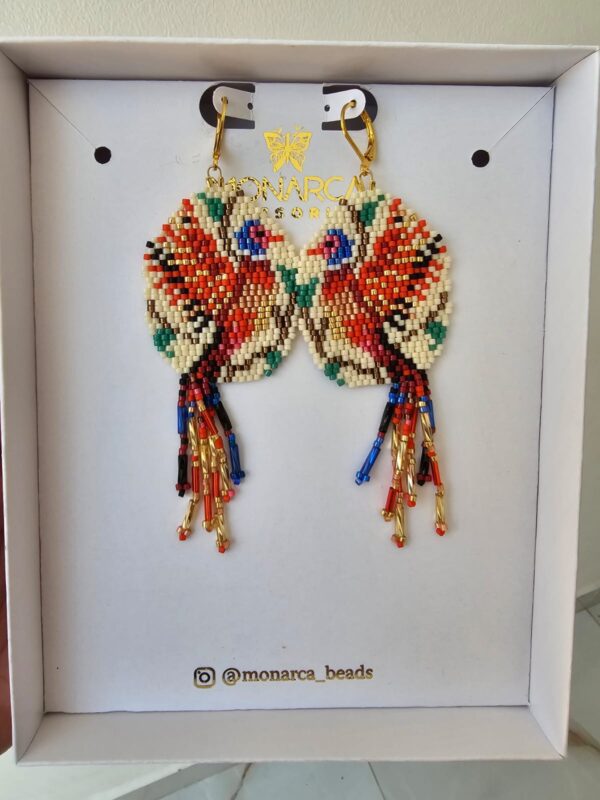 Aretes con forma de pavo real de la Coleccion Fenghuang